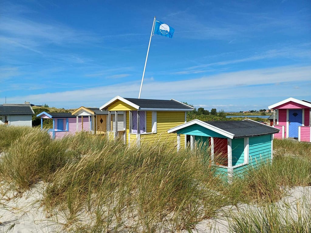 Bunte Badehäuschen in den Dünen bei Skanörs havsbad Skanör, Strand, Havsbad, Badehäuschen
